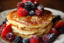 Soft vanilla bean pancakes topped with fresh berries. A comforting homemade breakfast recipe made with love and simple ingredients.